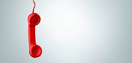 Dangling red telephone receiver