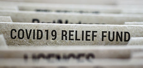 covid-19 relief fund file folder in filing cabinet