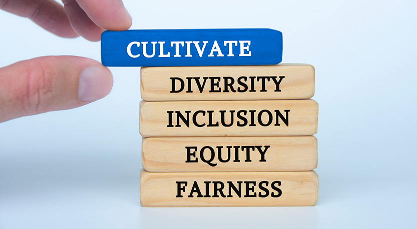 a hand placing blogs labeled Cultivate (Blue block), diversity, inclusion, equity, and fairness