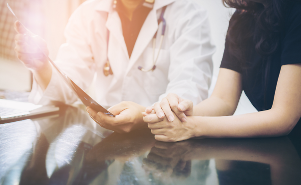 Doctor talking to patient