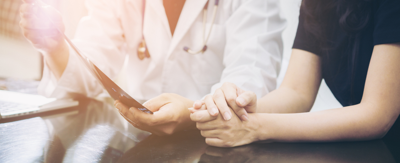 Doctor talking to patient