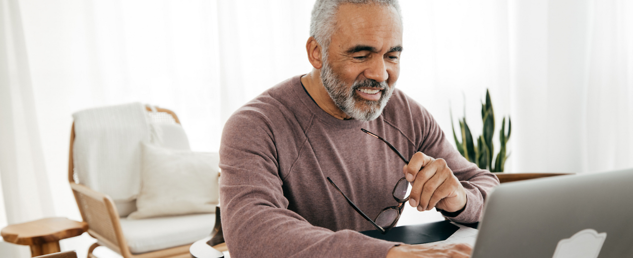 Person reviewing documents on computer