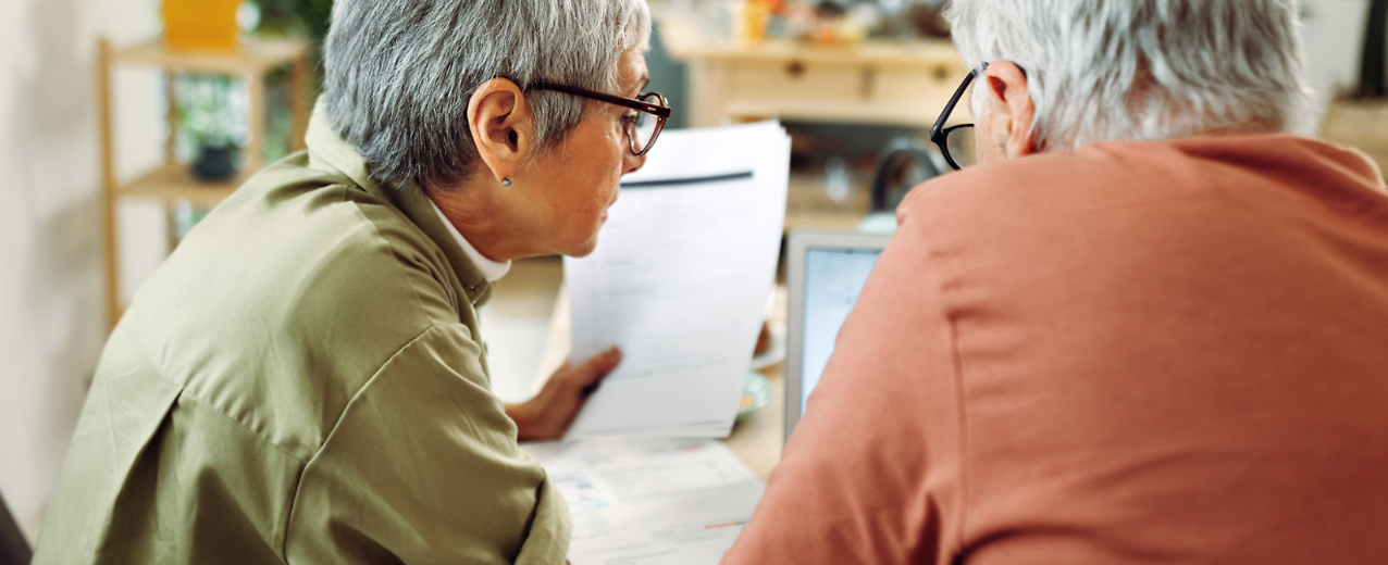 Two people discussing important documents