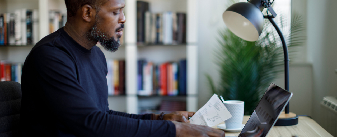 Man calculating budget and finances