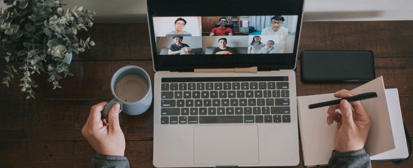 Person in front of a computer on a zoom call.