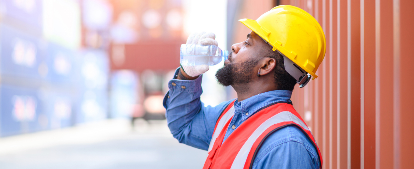 Worker taking a break to drink water